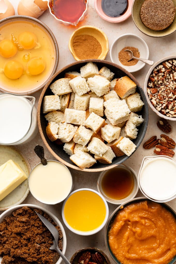 ingredients for bread pudding in bowls