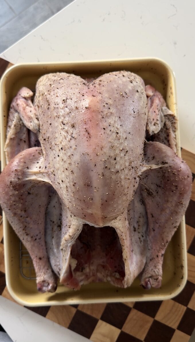 dry brined turkey in baking dish