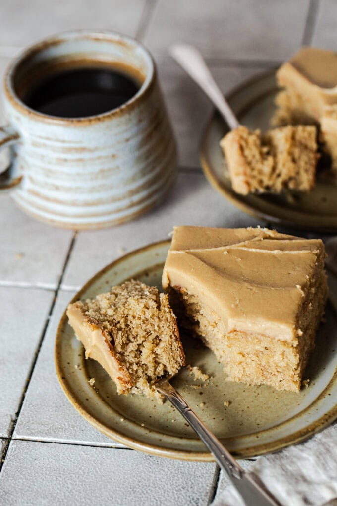 slice of caramel cake on plate with fork