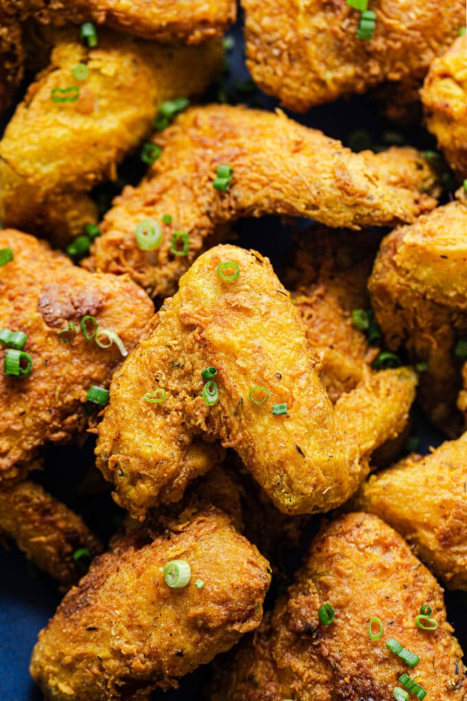 closeup of fried curry chicken wing