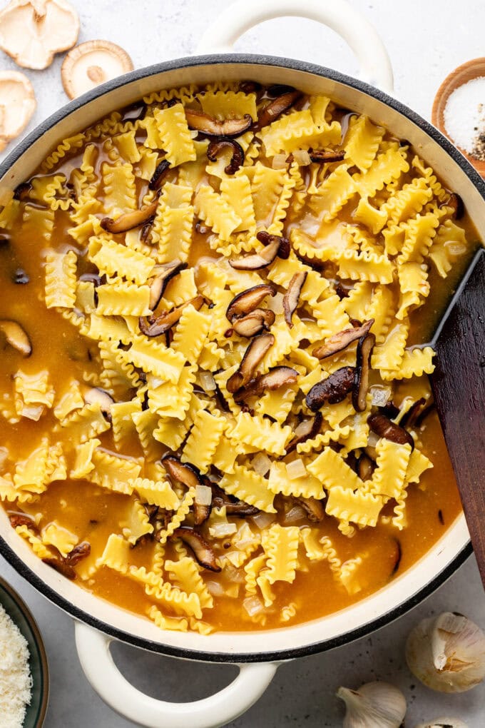 miso mushroom pasta in pot with broth