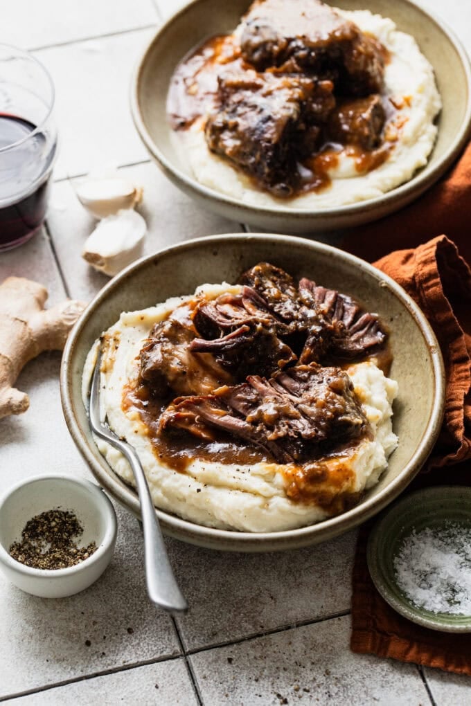 miso ginger braised short ribs with mashed potatoes in bowl with spoon