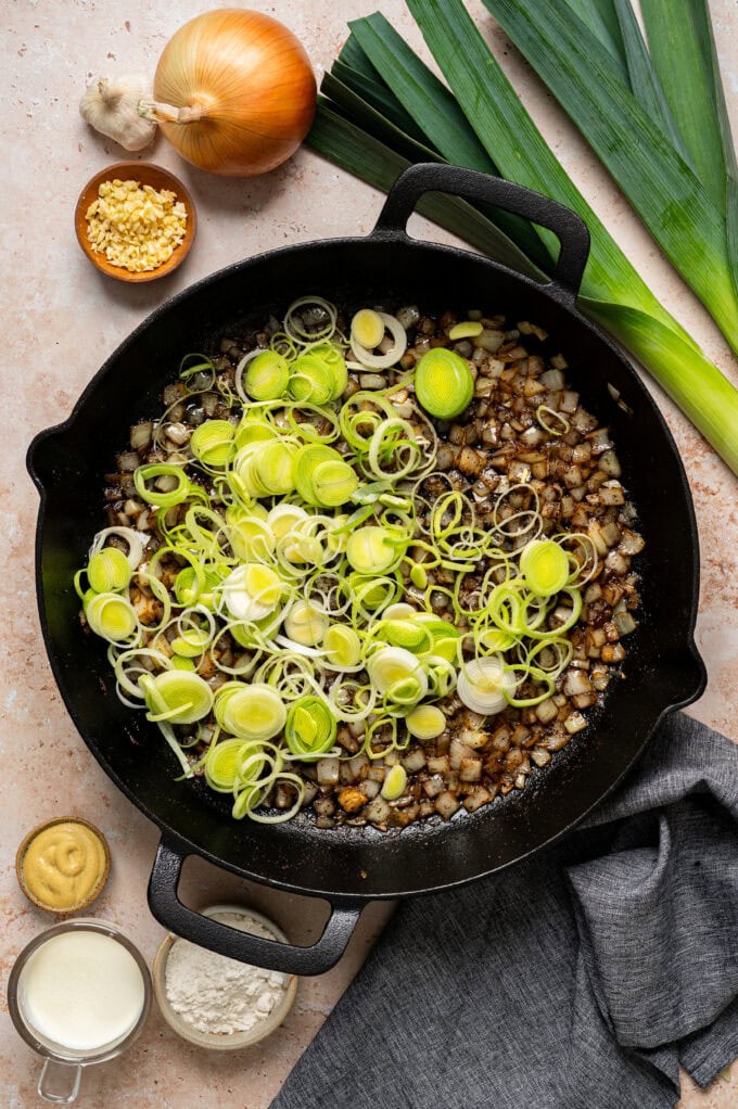 sautéed onion and leeks in skillet