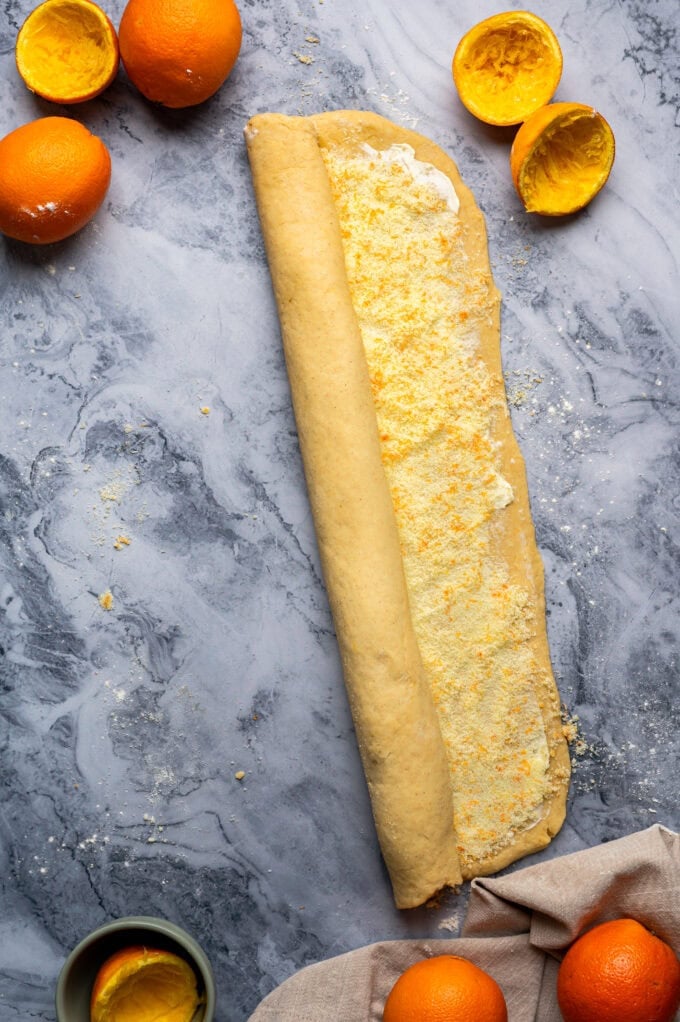 orange sweet roll dough rolled up