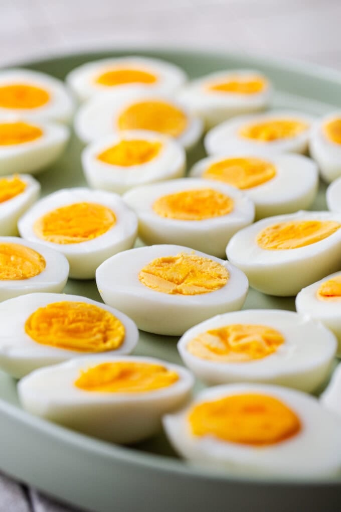 sliced hard boiled eggs on platter