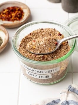 dry rub jerk seasoning in small glass jar