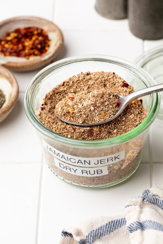 dry rub jerk seasoning in small glass jar