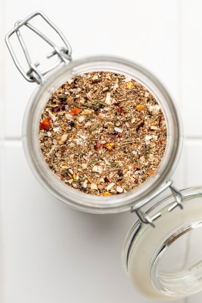 dry rub jerk seasoning in glass spice jar
