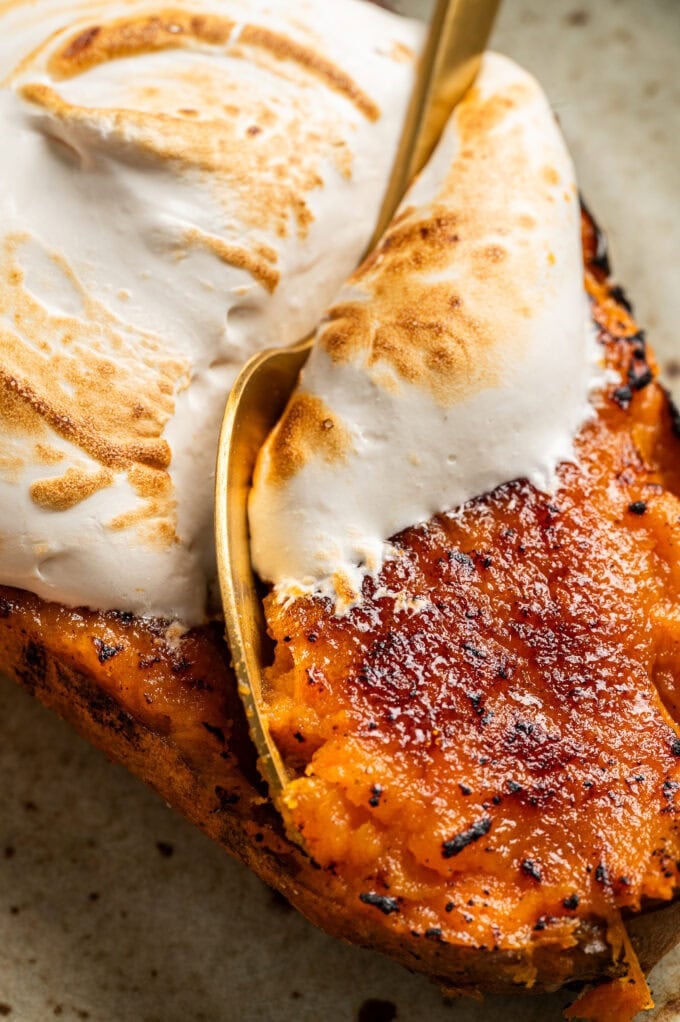 spoon inside of bruleed sweet potato