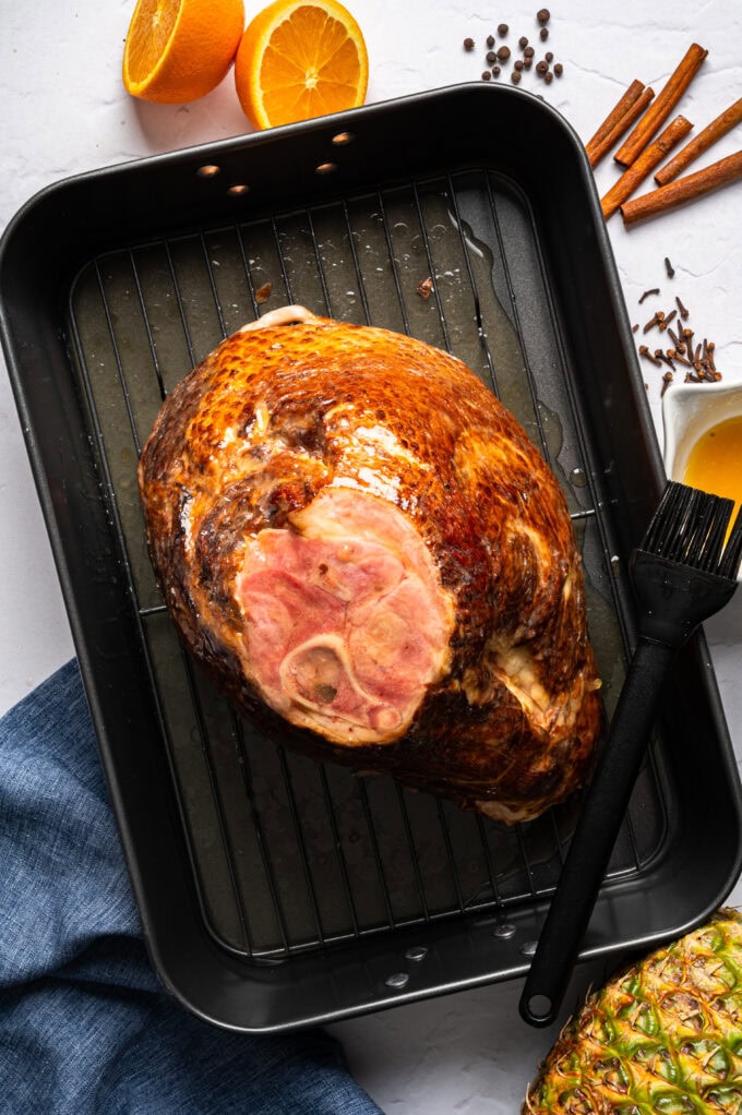honey butter glazed ham in baking pan