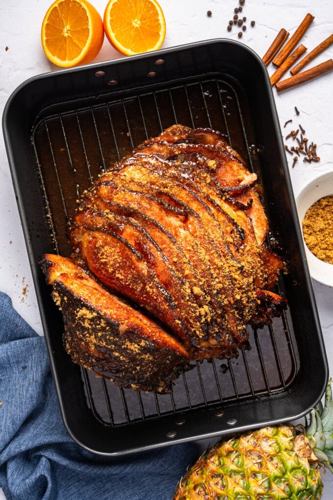 dry spice rub on baked ham in baking pan