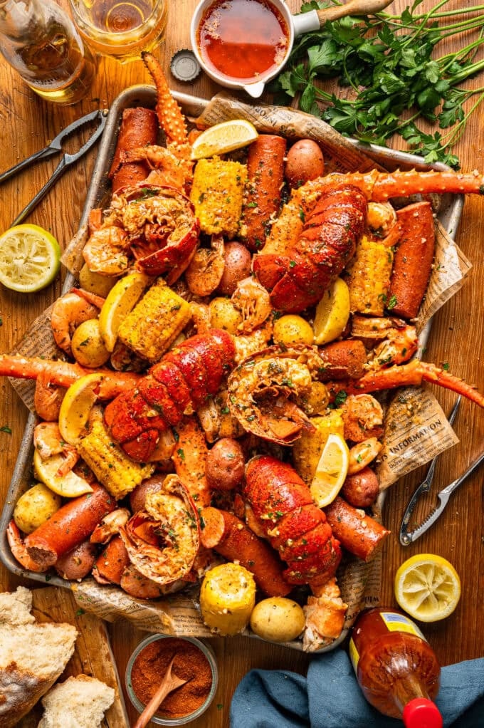 lobster seafood boil on large baking sheet