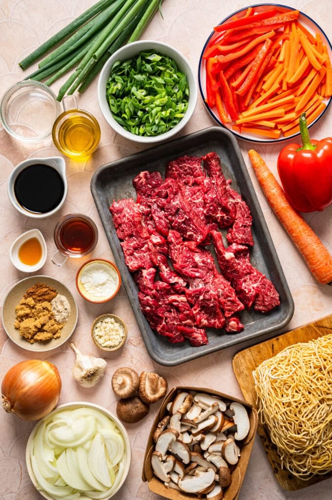 ingredients for steak lo mein in bowls