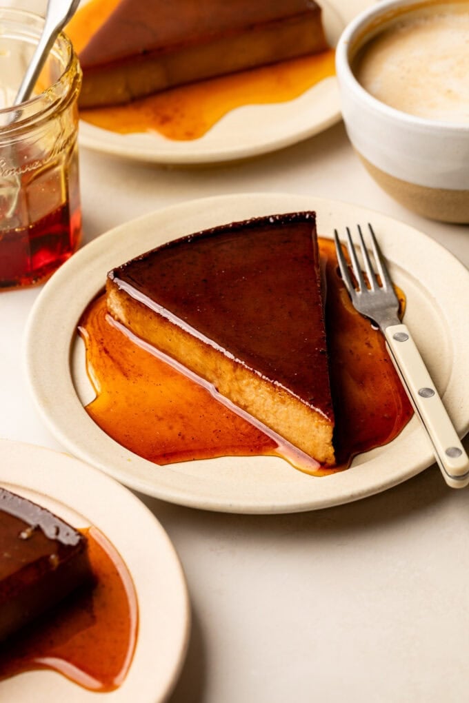 slice of flan on plate with fork