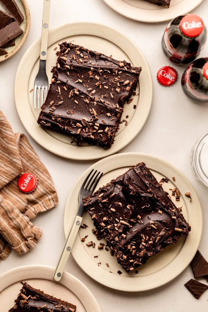 sliced chocolate cola cake on small plates