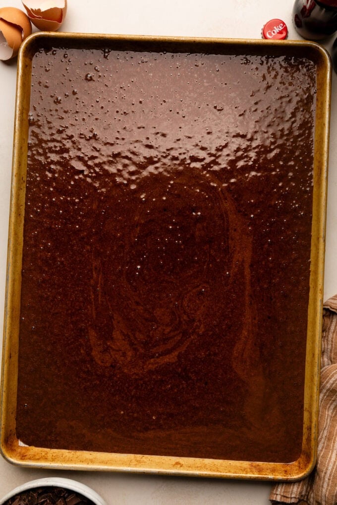 chocolate cake batter in baking sheet