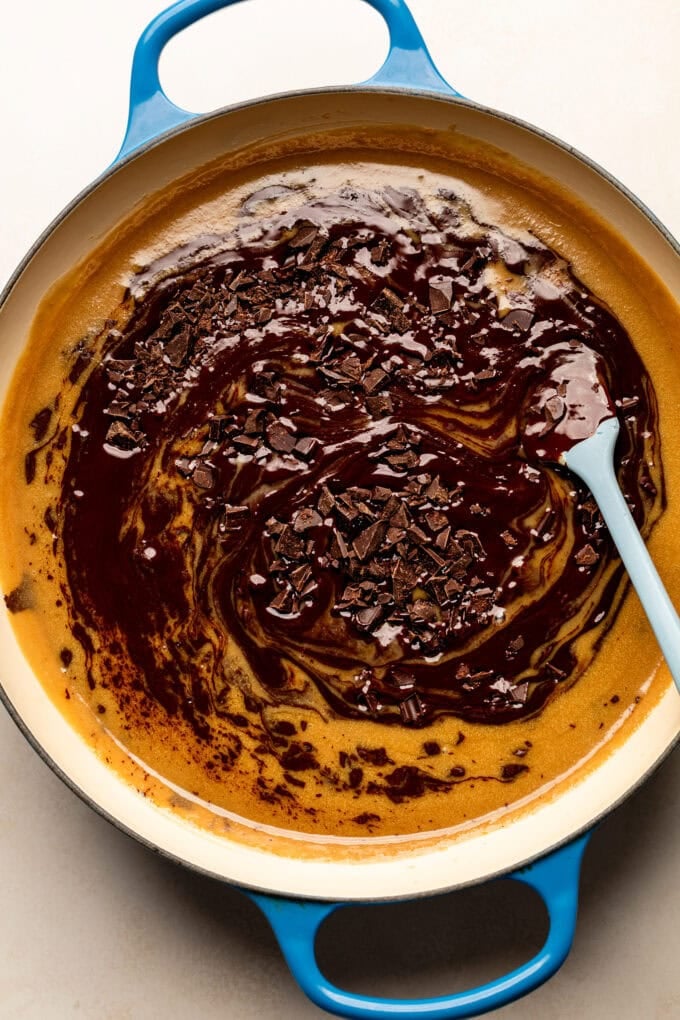 chopped chocolate in saucepan with cream