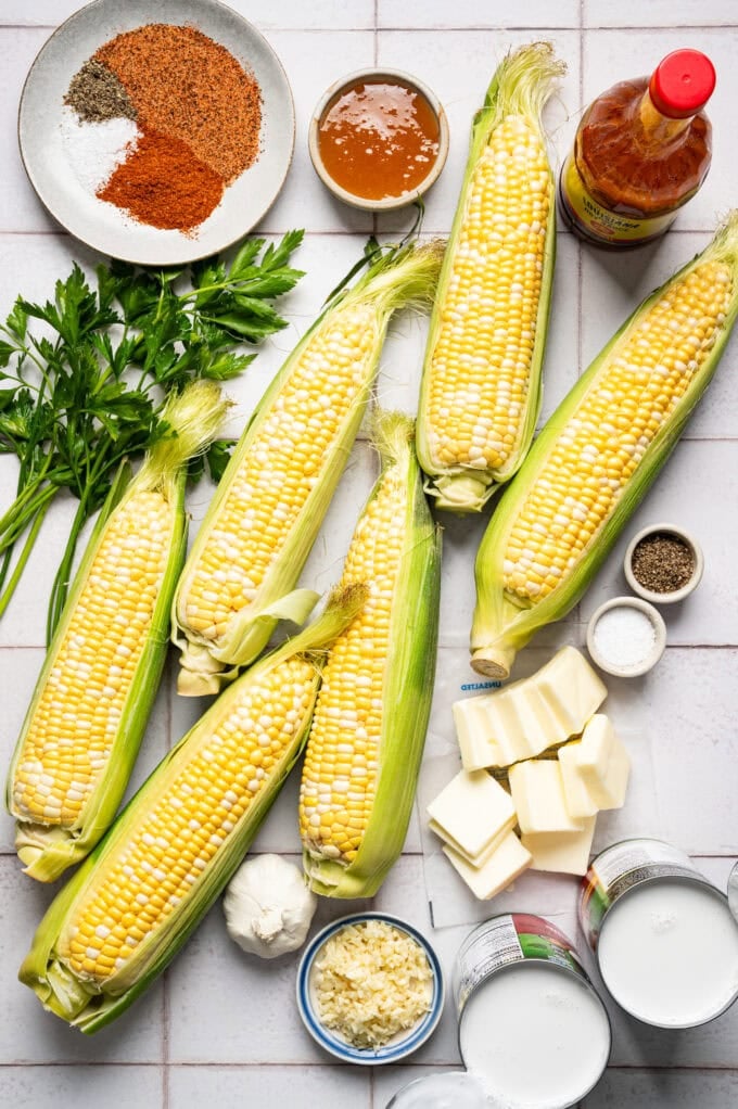 corn on the cob ingredients laid out on surface