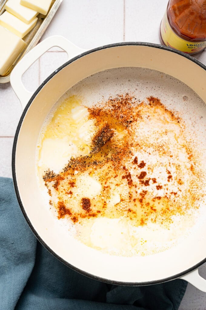 spices and coconut milk in large pot