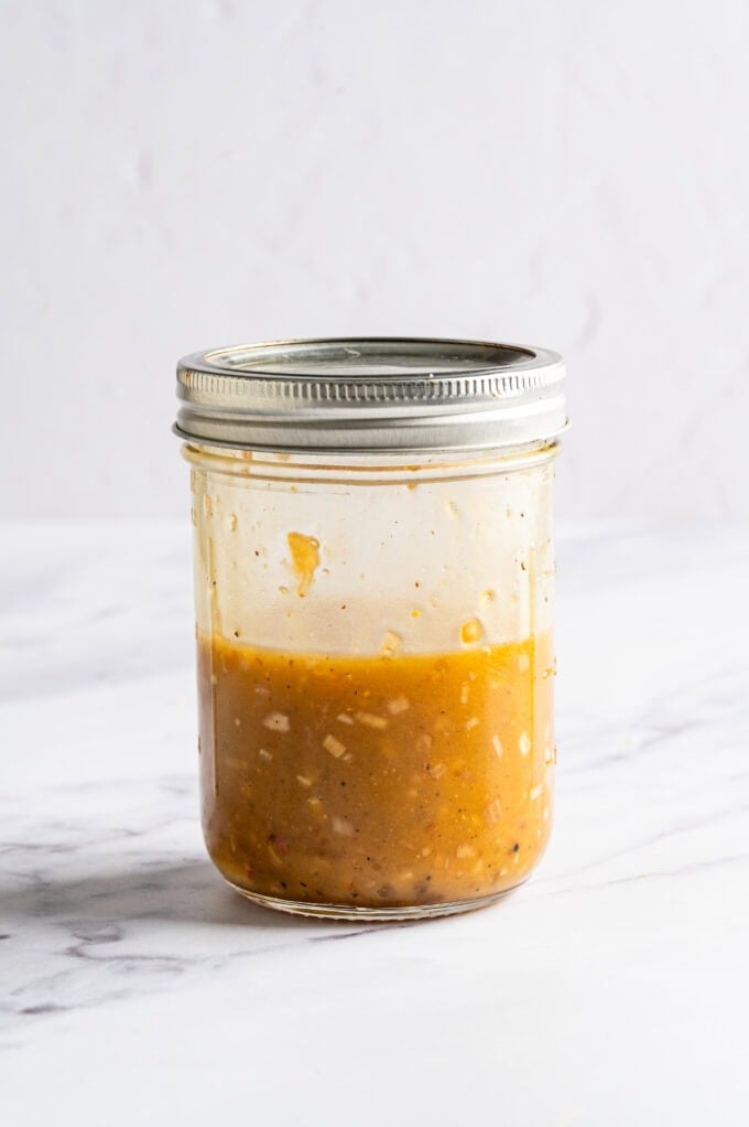 peach shallot vinaigrette in mason jar