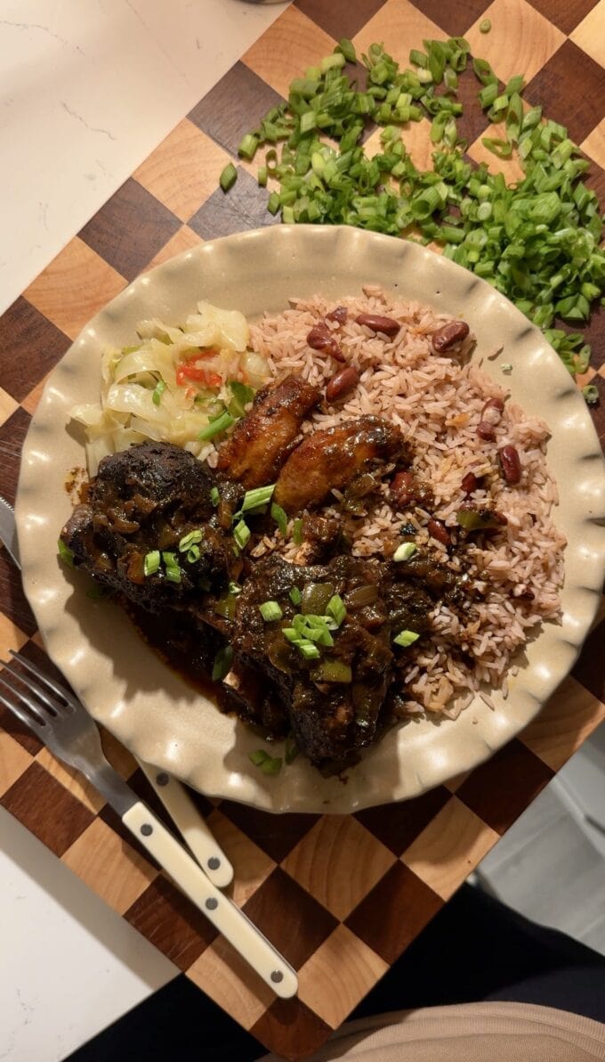 brown stew short ribs on plate with rice and cabbage