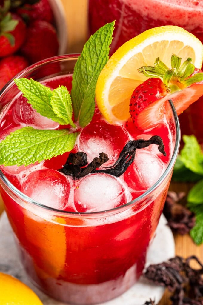 closeup of strawberry hibiscus lemonade in glass