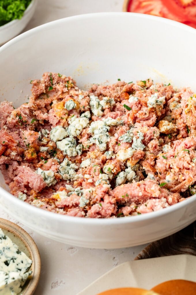 raw ground turkey burger meat in bowl