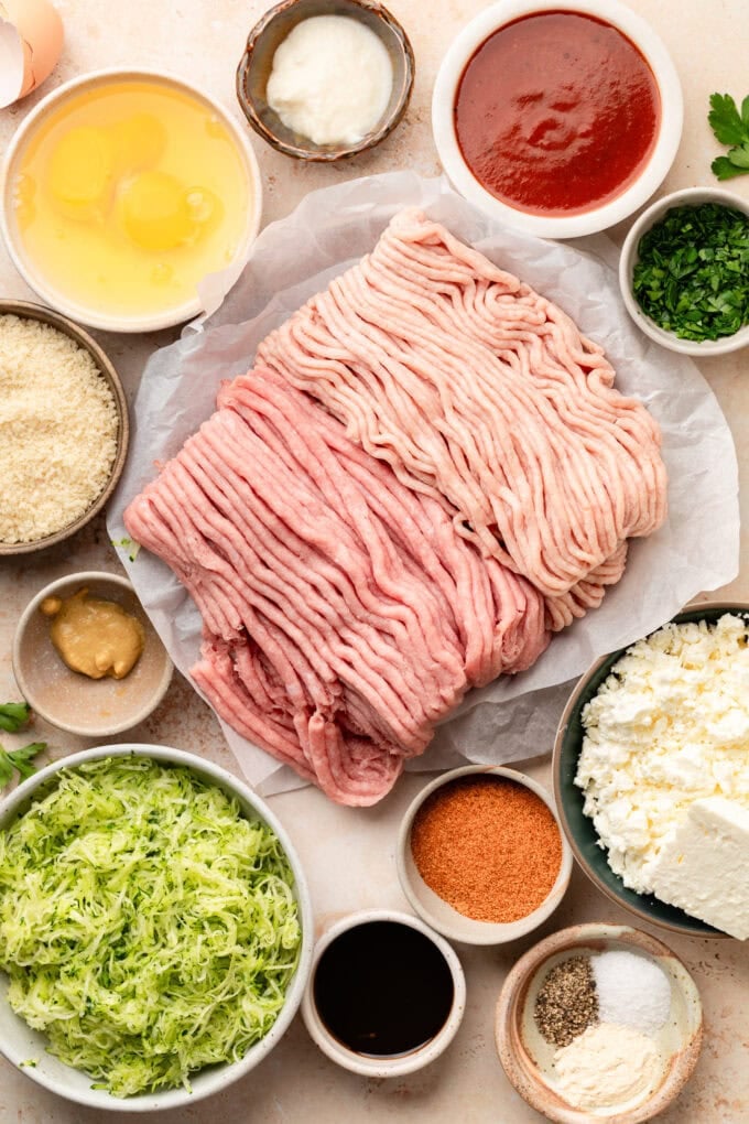 ingredients for zucchini feta meatload in bowls