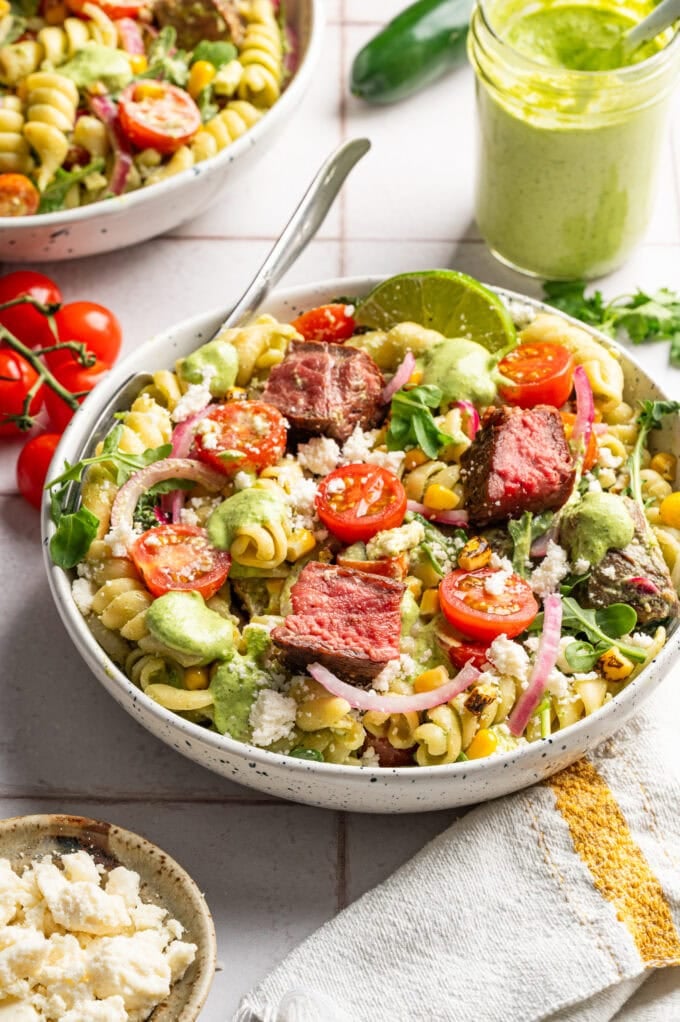 steak pasta salad in bowl