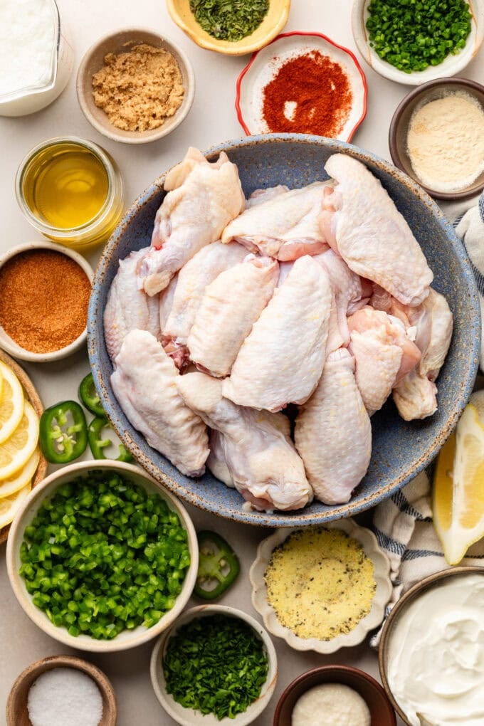 ingredients for grilled chicken wings in bowls