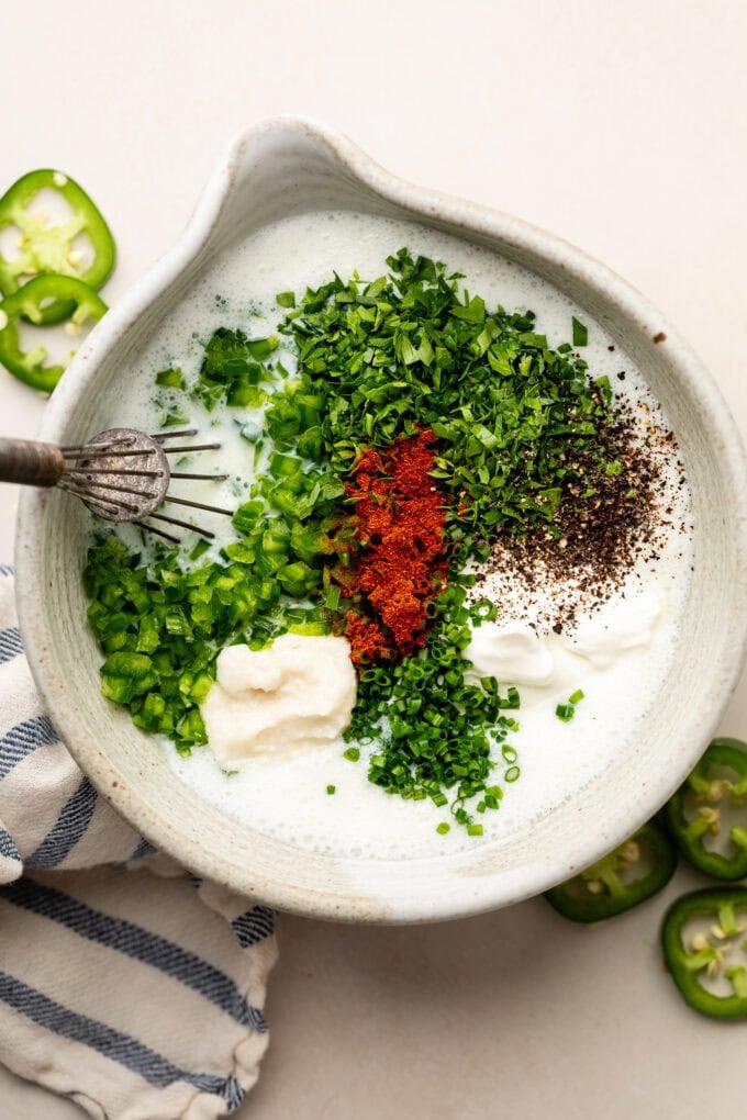 jalapeno ranch in bowl with whisk