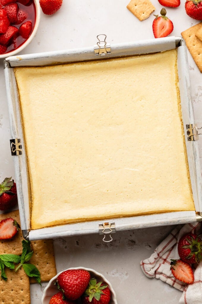 cooked cheesecake in baking pan