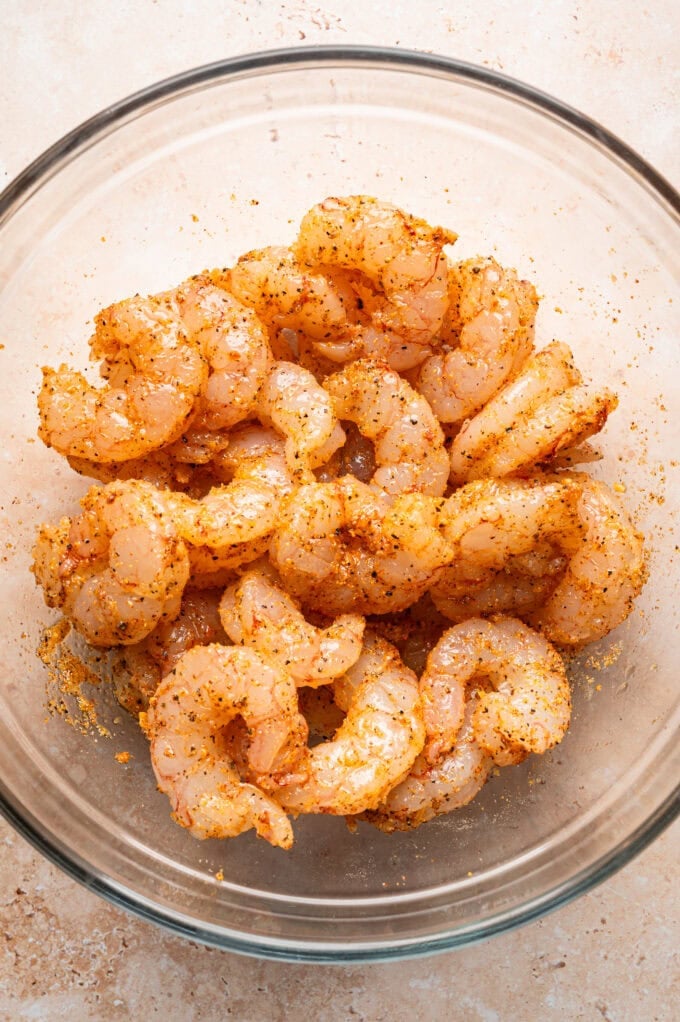 seasoned shrimp in glass bowl