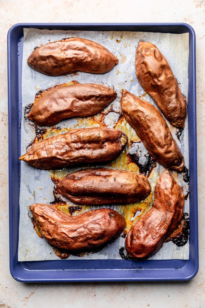 roasted sweet potato halves on baking sheet