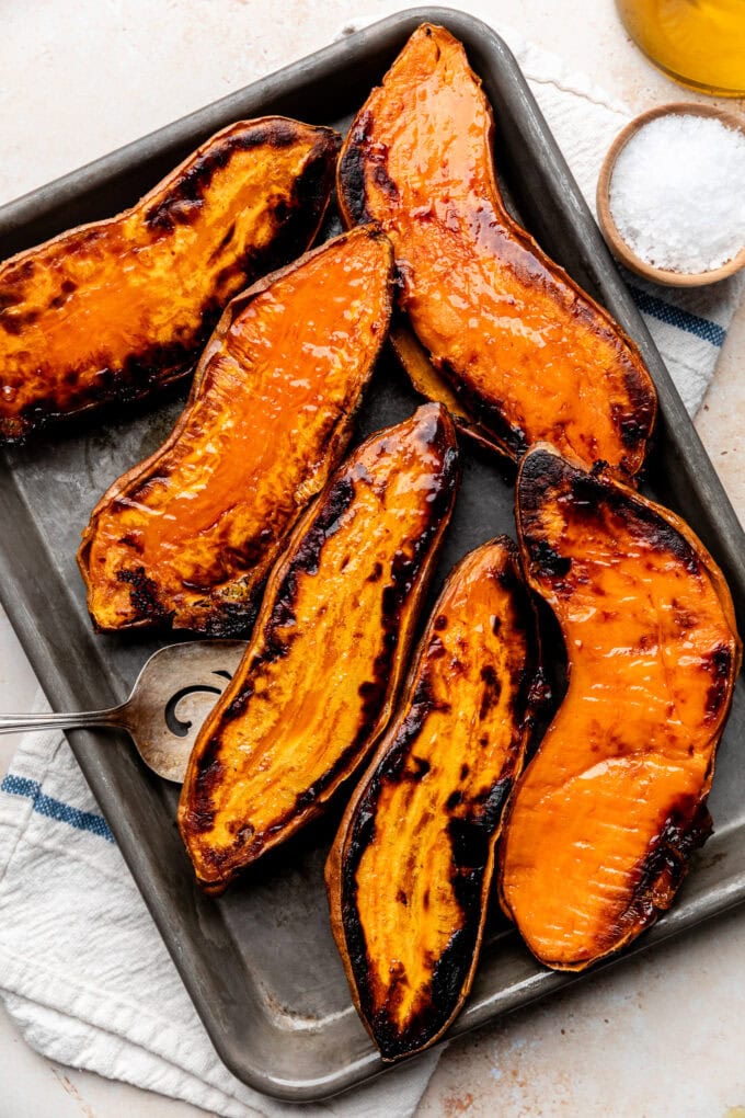 roasted sweet potato halves on baking sheet