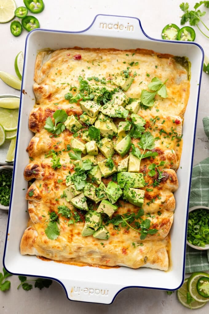 spinach chicken enchiladas in baking pan