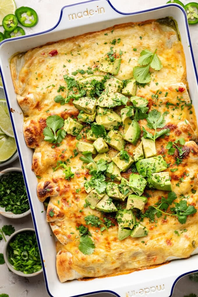 spinach chicken enchiladas in baking pan