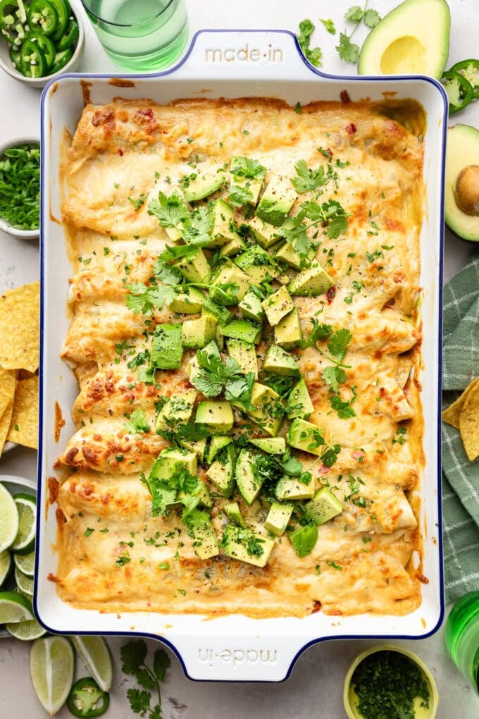 spinach chicken enchiladas in baking pan