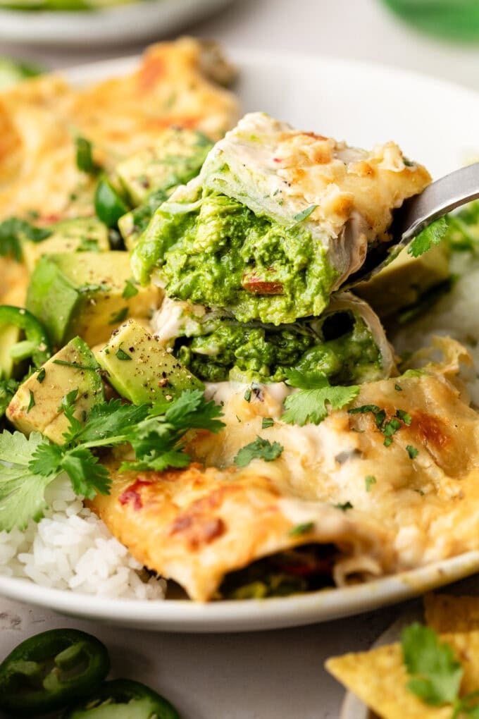 spinach chicken enchilada on fork