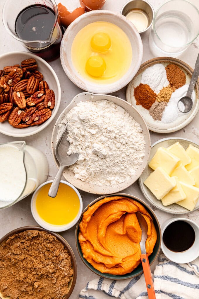 ingredients for sweet potato waffles with butter pecan syrup in bowls