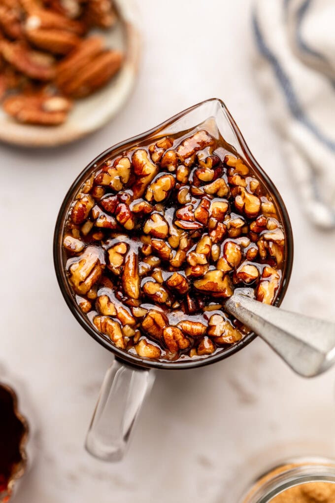 butter pecan syrup in glass measuring cup