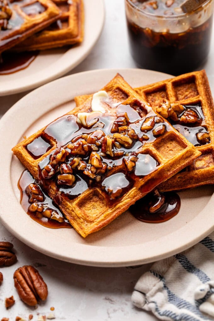 sweet potato waffles with butter pecan syrup on plate