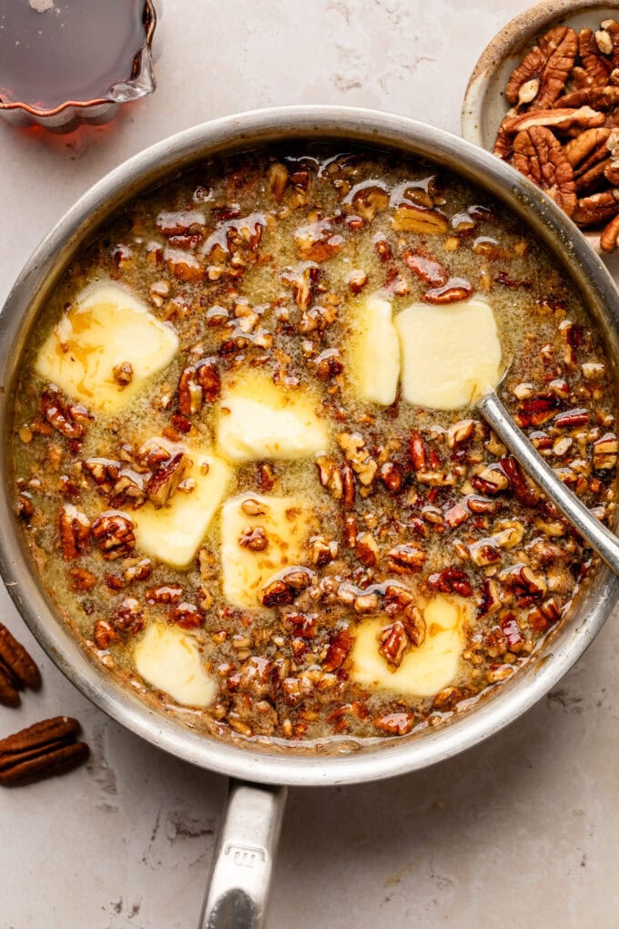 butter in saucepan with pecans