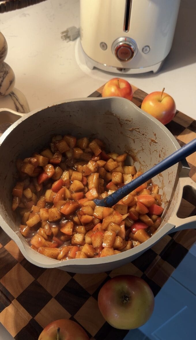 spiced chopped apples in saucepan