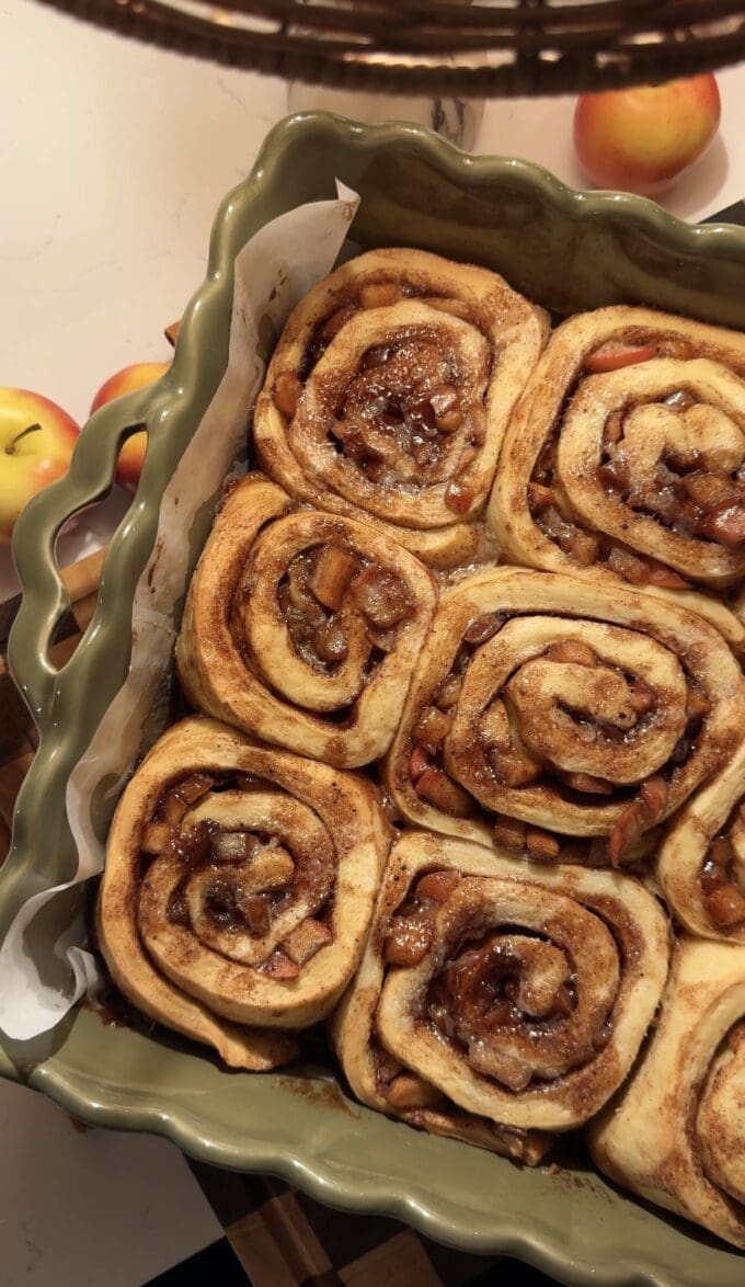 baked apple cinnamon rolls in baking pan