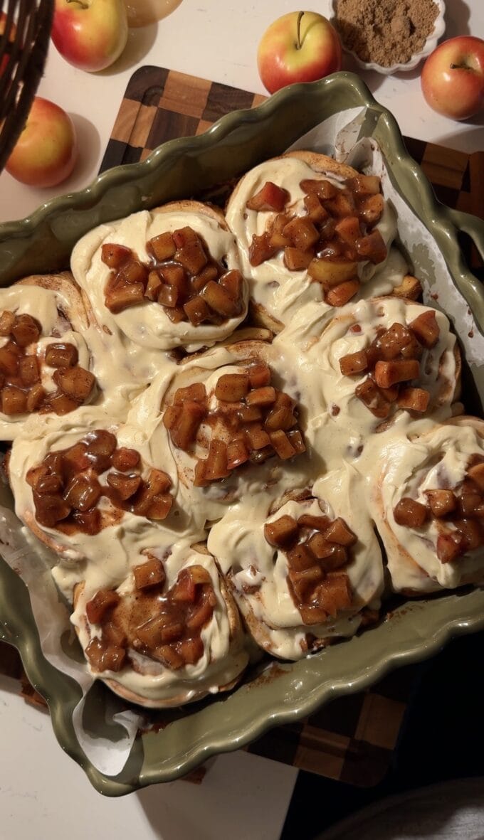 apple cinnamon rolls in green baking pan