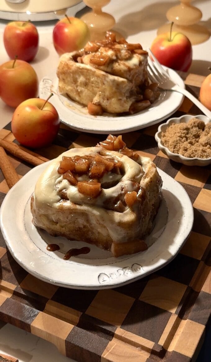 apple cinnamon rolls on small white plates